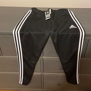 Adidas jogging pants.